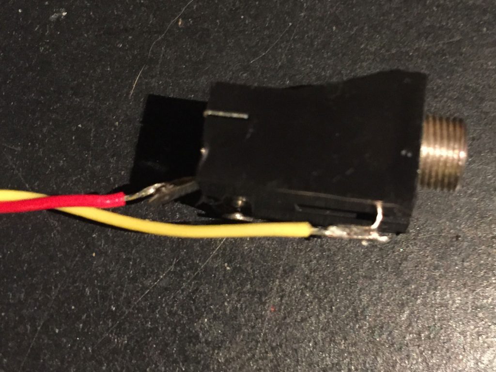 3.5mm audio socket - signal (red) going to the tip, ground (yellow) to the sleeve