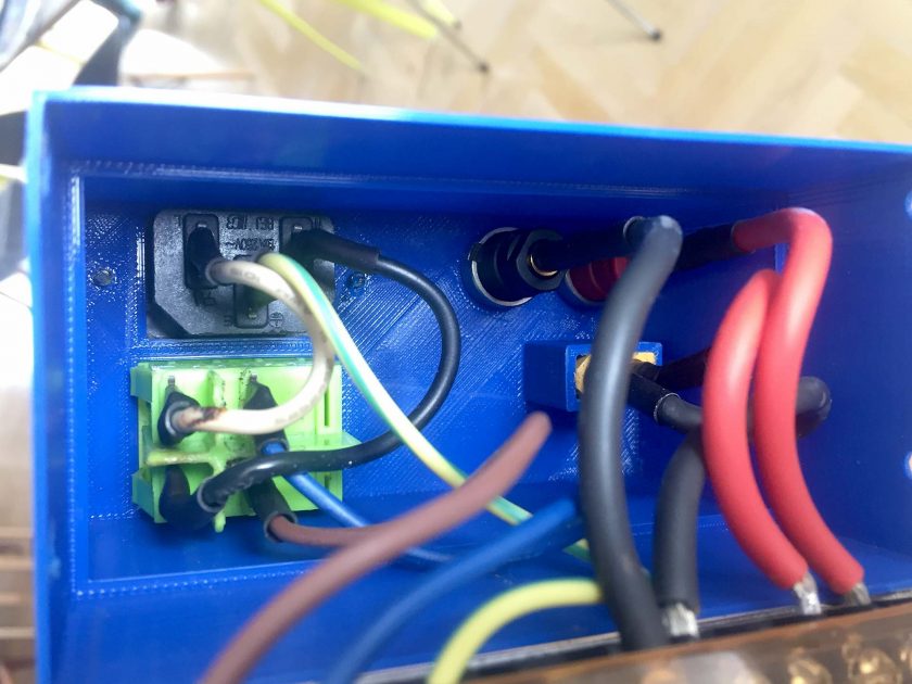 power supply endcap with 240 V socket, switch, XT60 and banana plugs installed
